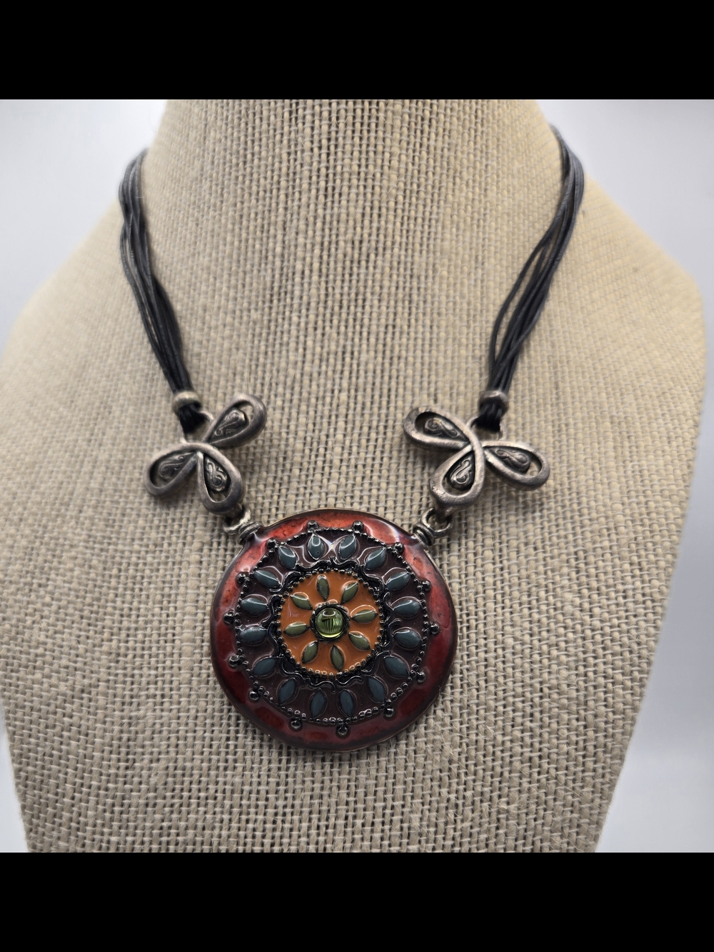 Chico's Red Orange Floral Enamel Medallion Necklace Black Cord Silvertone Accent